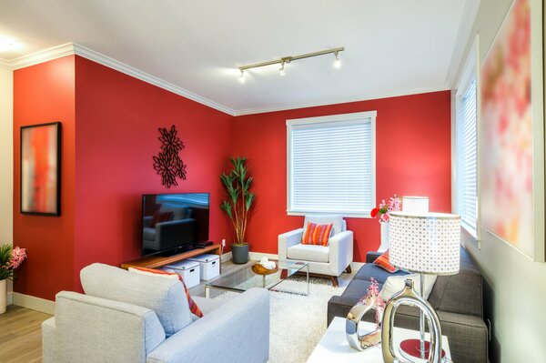 The interior of the living room in red colors photo