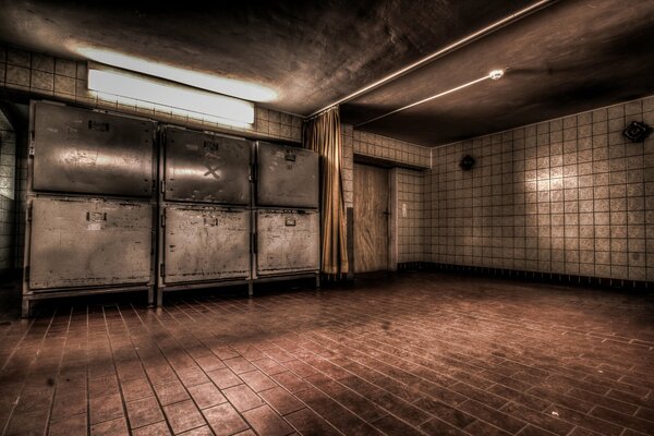 An empty morgue in a hospital with refrigerators