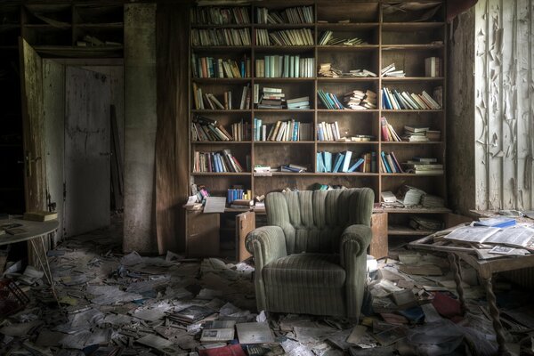 An abandoned library with scattered books and an old armchair