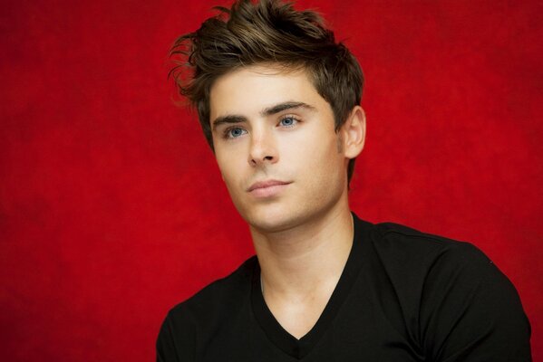 Portrait of Zac Efron in black clothes