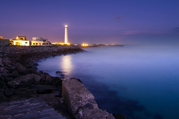 Night sea shore with steps