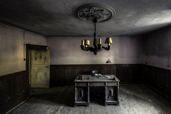 A dark room with a table