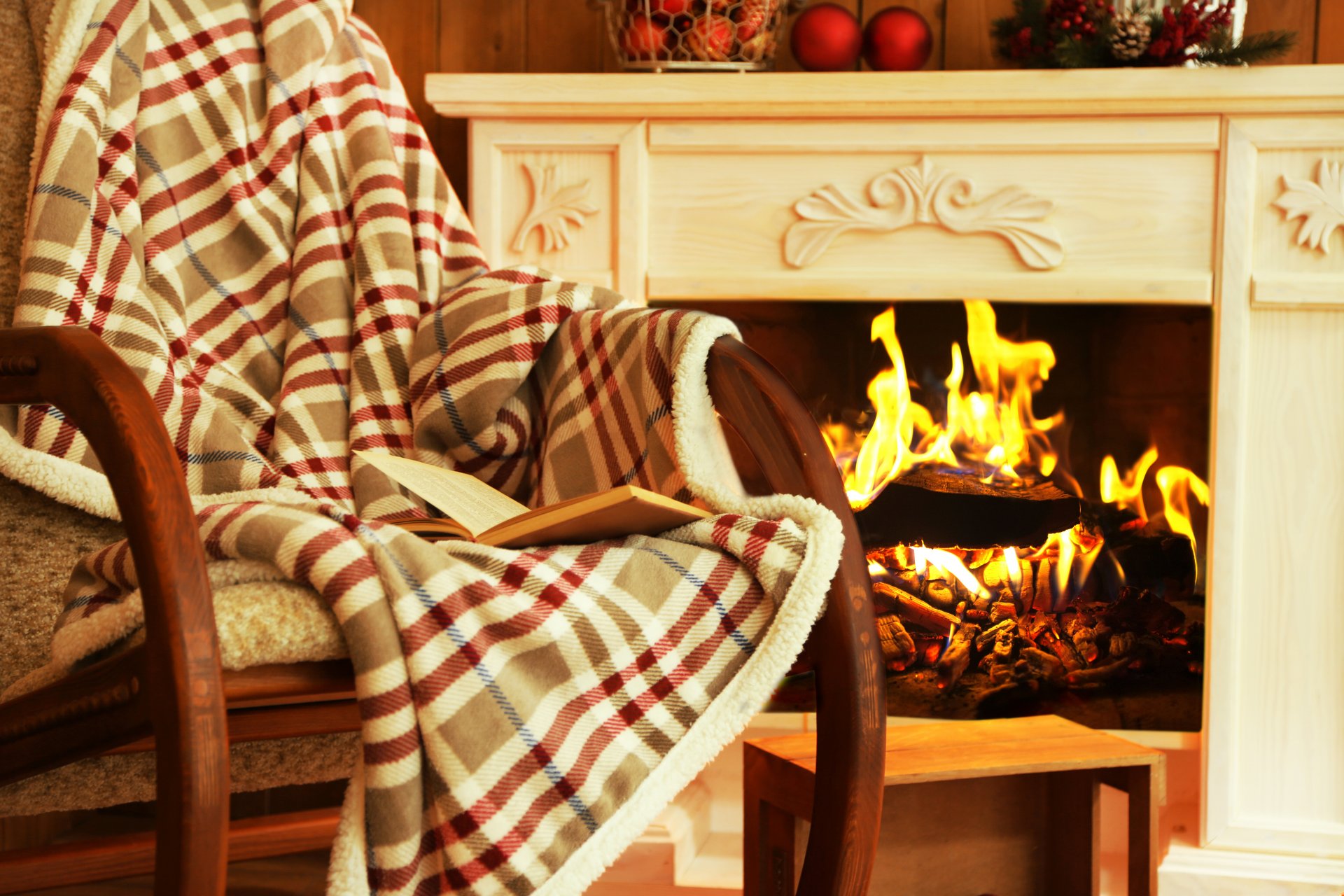 interior fireplace plaid comfort chair