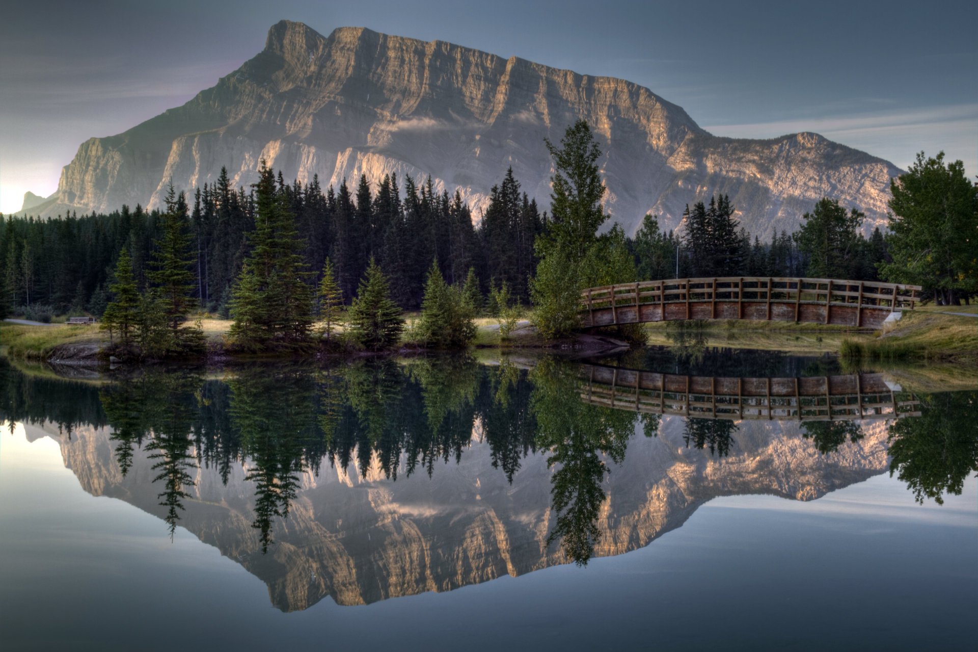 mountain bridge forest reflection river