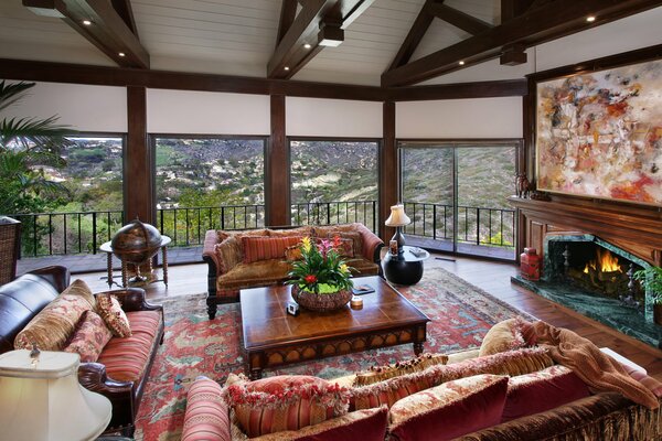 Living room sofas mountains outside the window