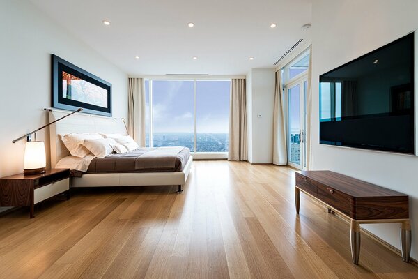 Minimalistic bedroom interior with sea view