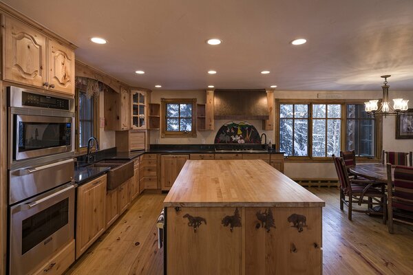 Stylish rich wood-paneled kitchen