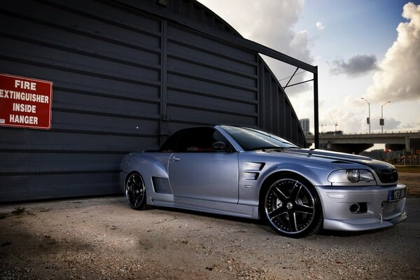 Bmw m3 convertible near the garage