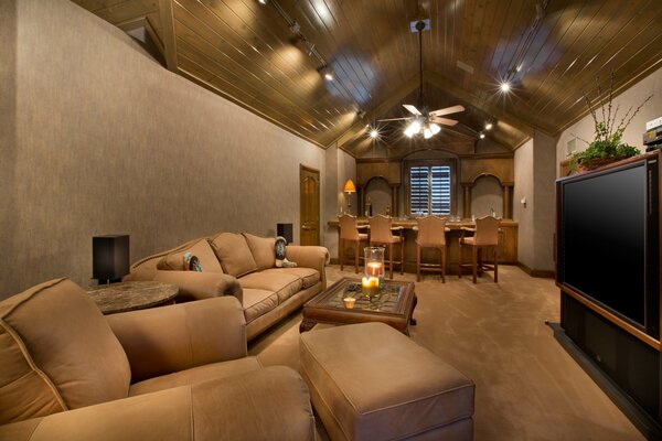 The interior of the living room with an unusual beautiful ceiling