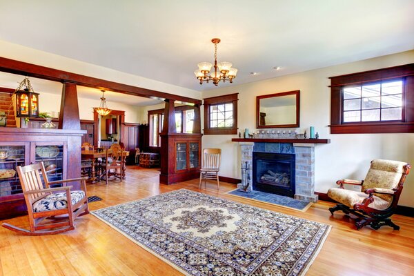 Cozy spacious living room with wooden furniture