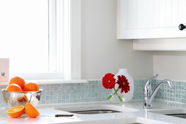 Oranges on the kitchen sink