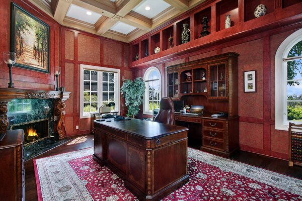 Bureau classique avec cheminée et meubles en bois