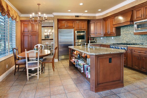 Kitchen interior with island and kitchen table