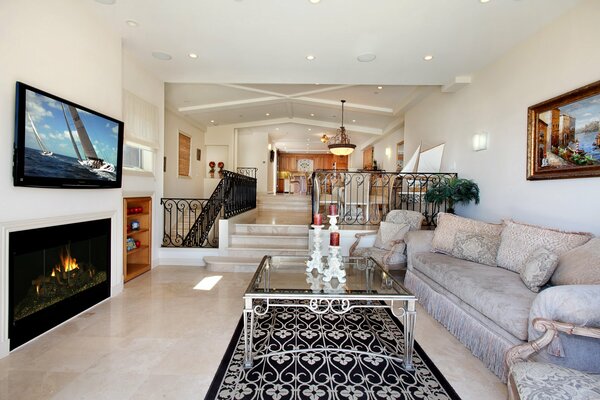 Interior of the living room with TV and fireplace