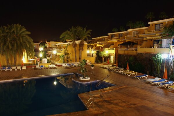 Swimming pool at night at a resort in Spain