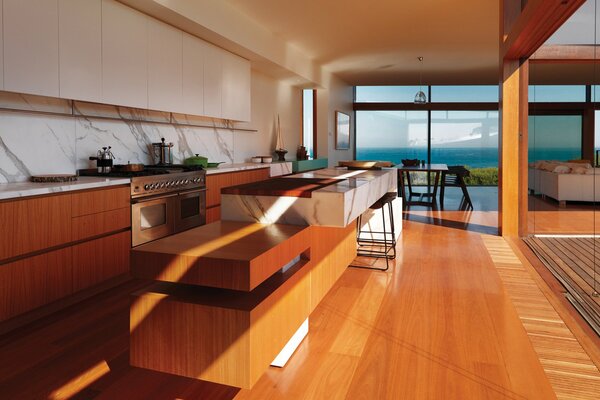 Huge kitchen with panoramic window overlooking the sea