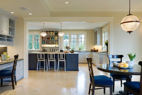 Modern interior of the kitchen combined with the living room