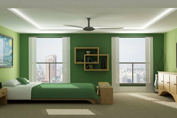 The bedroom is in calm green tones. Concise design