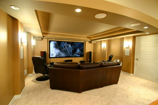 Interior of a home theater with a sofa