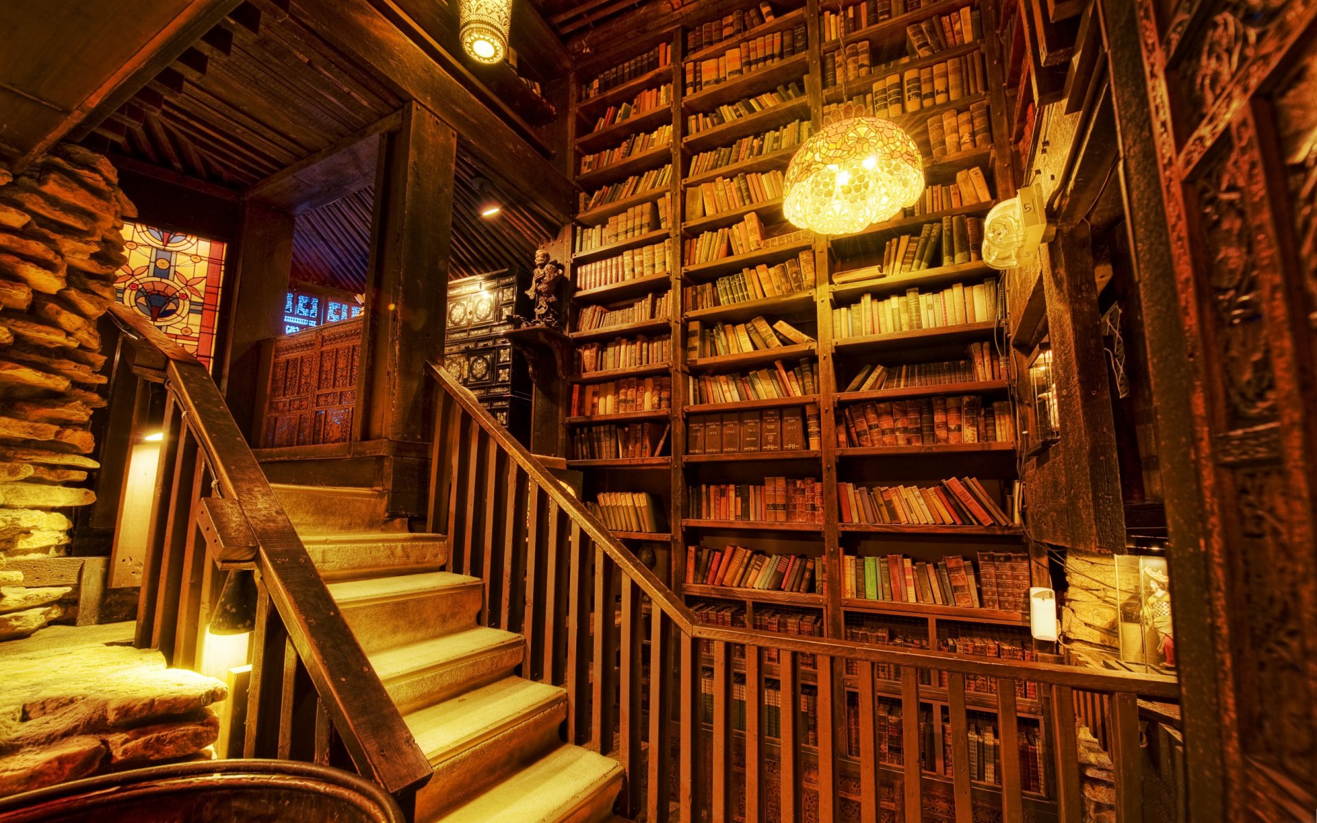 library books shelving stairs light