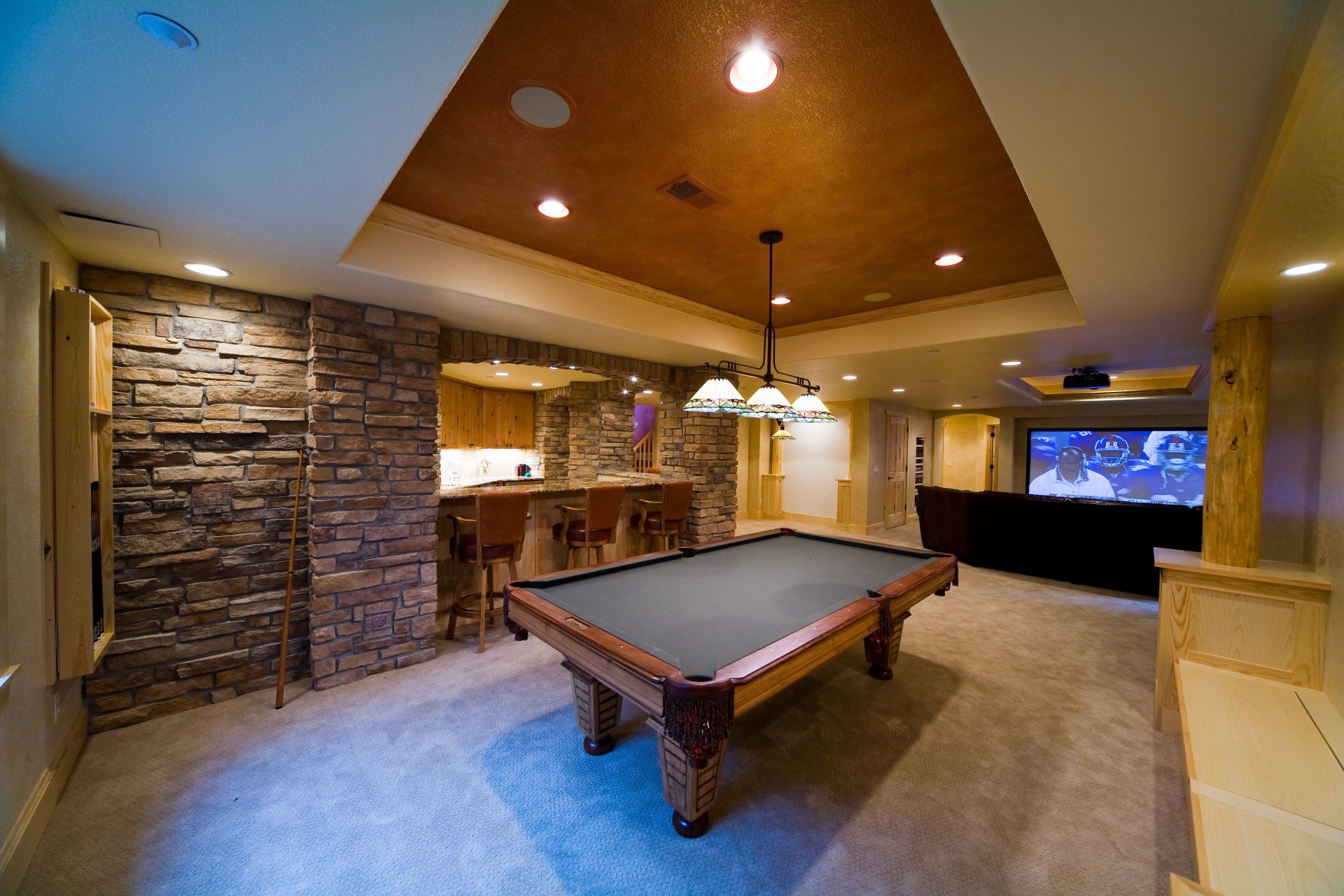 interior game room billiards table design style game room billiard room cue bar chairs bar counter sofa movie projector