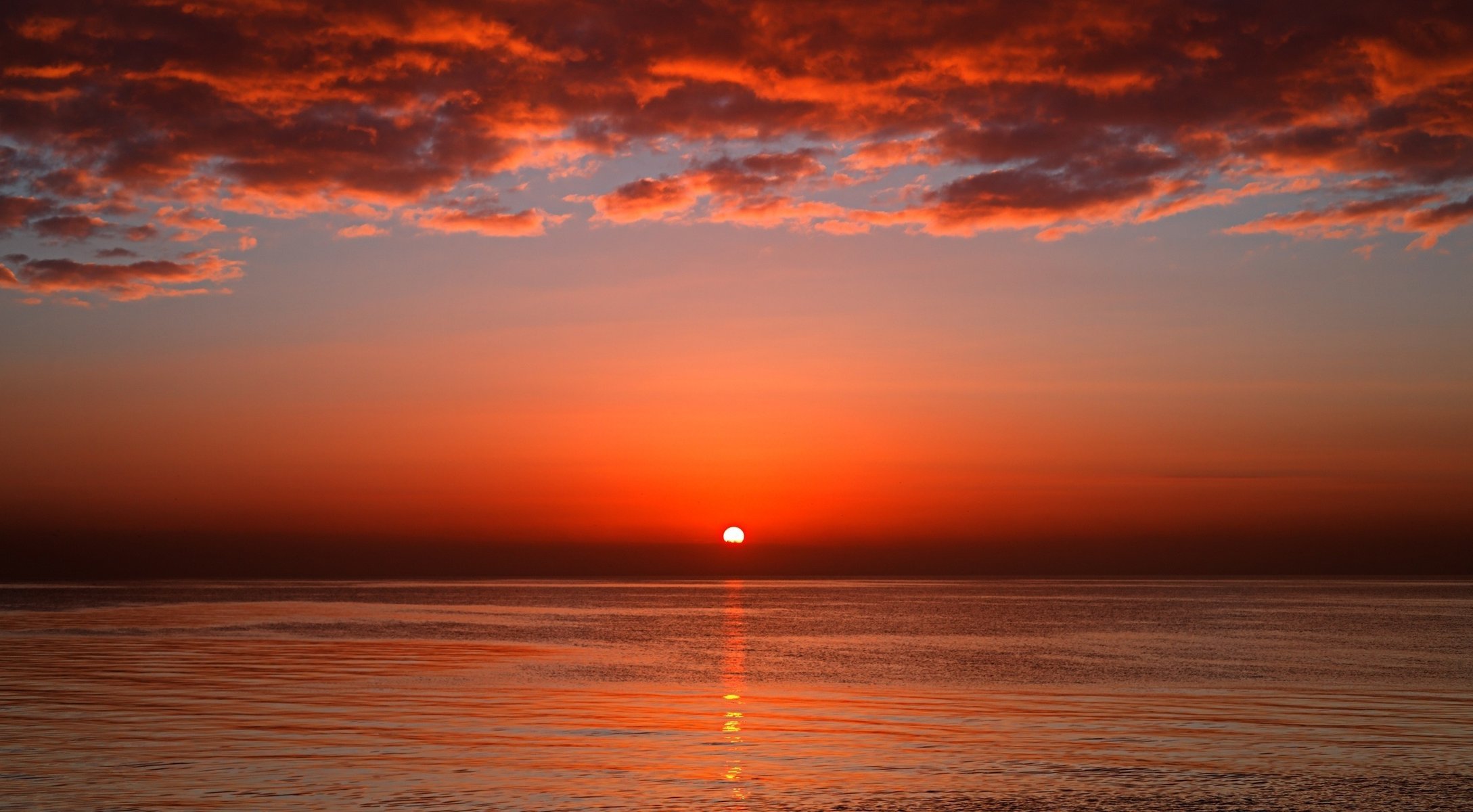 mar puesta de sol noche