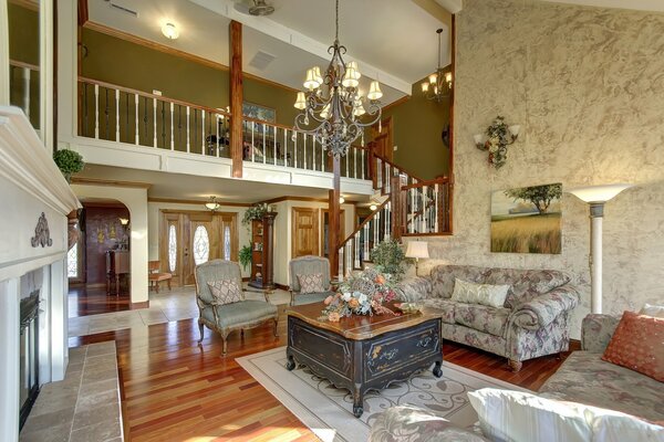 The interior of the living room staircase and fireplace are mandatory