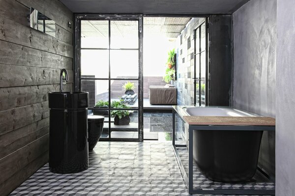 Elegante baño de estilo oscuro