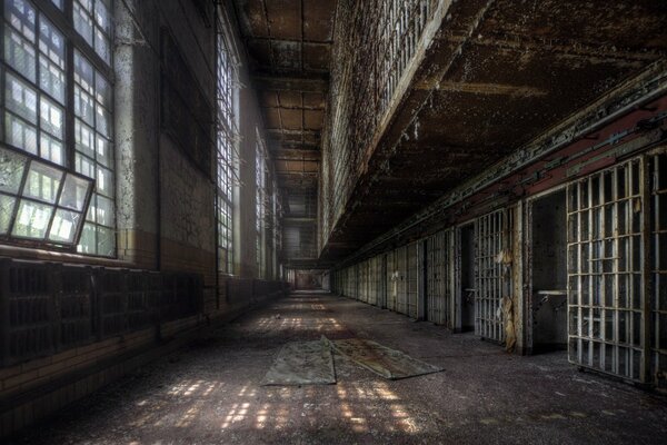 Deserted gloomy prison corridors