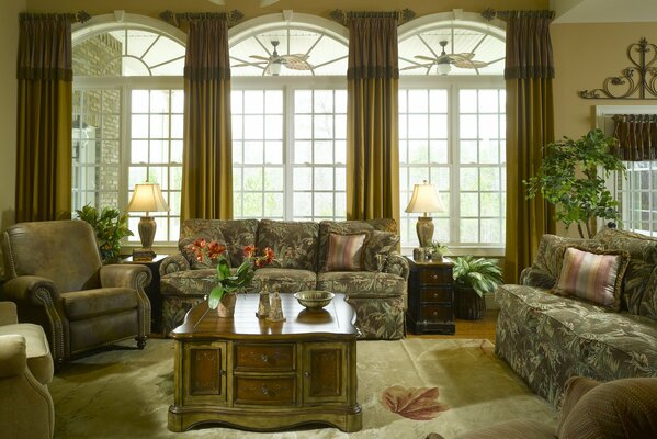 Large room with windows and furniture