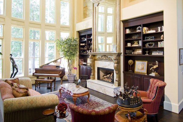 The interior of the living room. The piano. Wardrobes