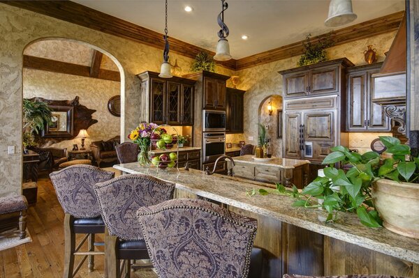 Kitchen with a breakfast bar and flowers