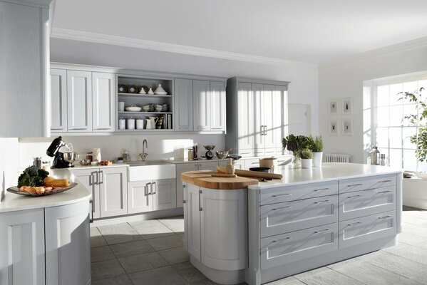 Stylish design of the kitchen in a snow-white shade