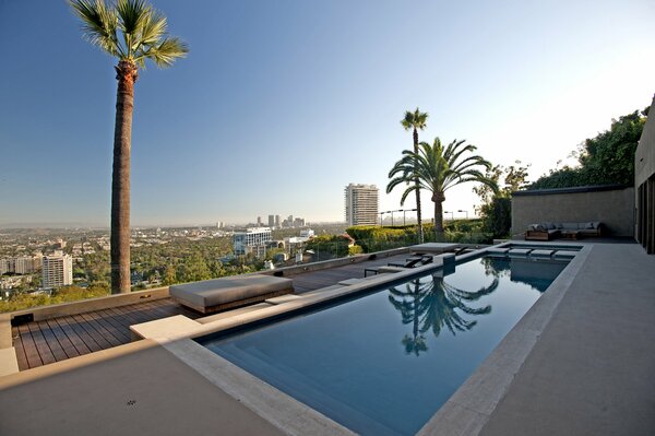 Outdoor swimming pool near the metropolis