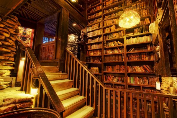 Photo of an old library with a staircase