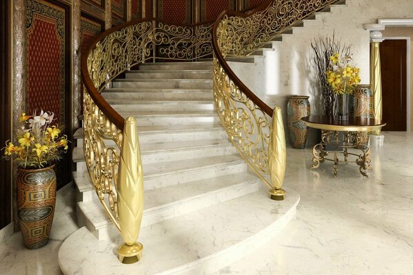 Escalier intérieur. Mains courantes dorées