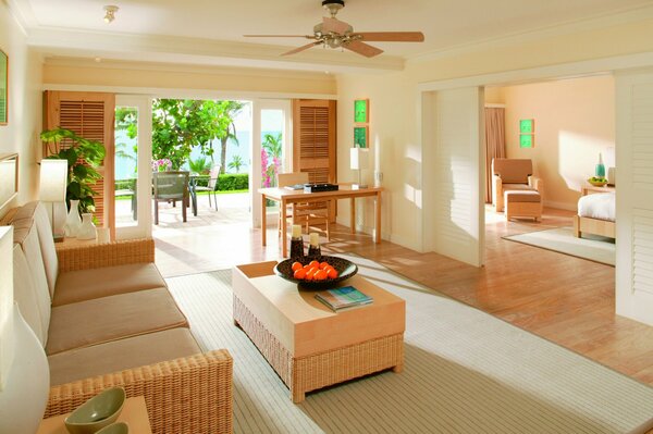 Bright and cozy living room in beige tones