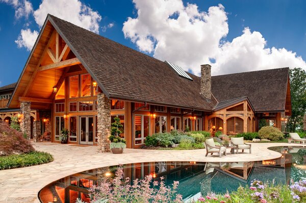 Wooden house with stone pillars