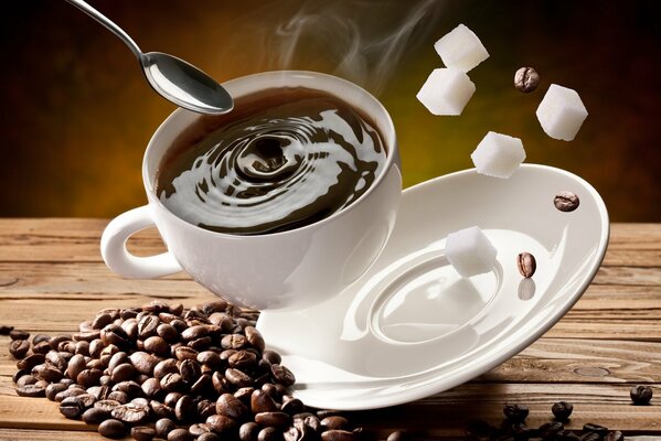 Coffee and grains with sugar cubes in a white glass and saucer