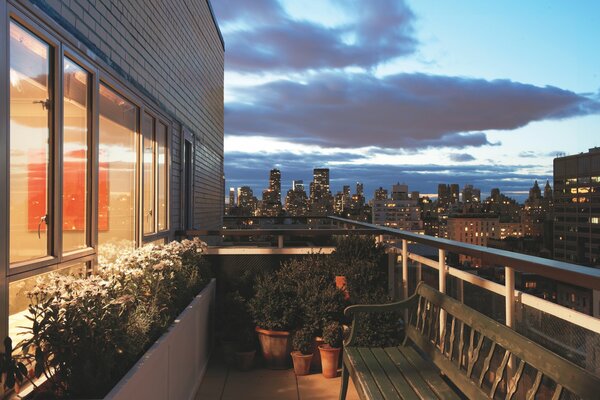 Interior of a balcony with a view of the city