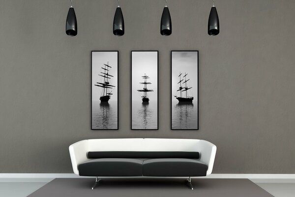 Minimalism black and white coloring sofa on the background of paintings