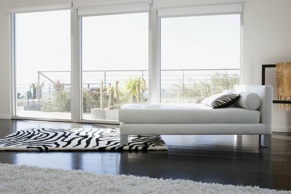 Bright bedroom with large windows