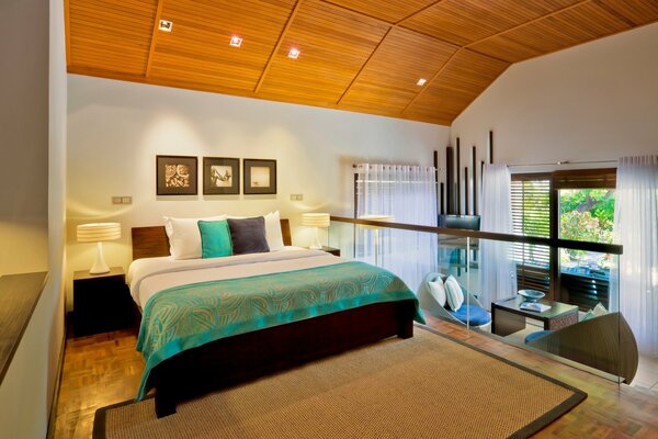 Spacious open room with turquoise accents