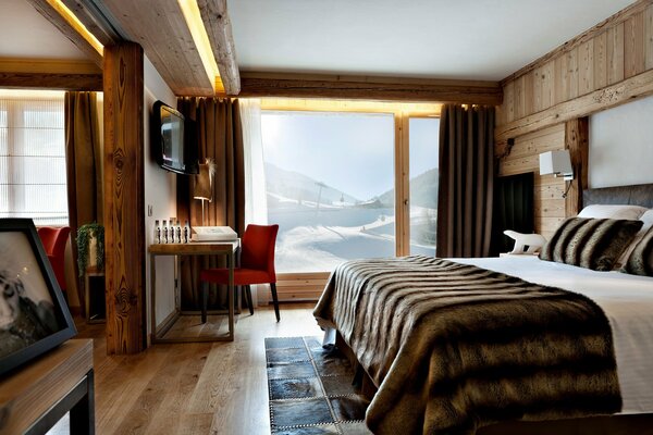 Stylish bedroom in a house with a beautiful view