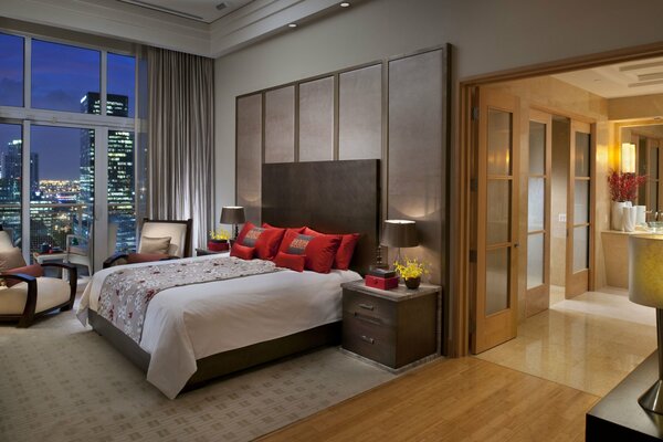 Luxury house bedroom with a view of the skyscrapers