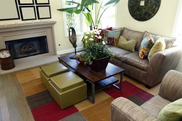 The interior of a small room with a fireplace