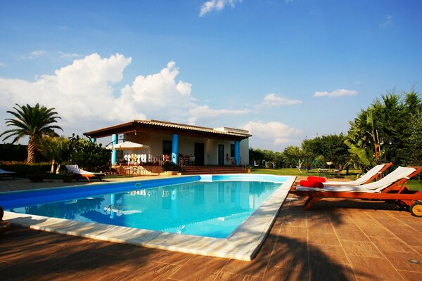 A wide swimming pool in a country house