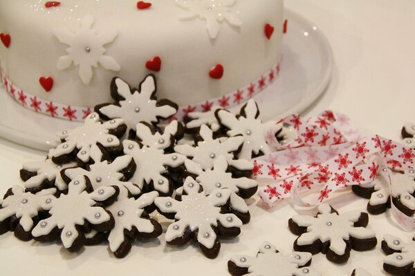 Christmas treat white cookies in the form of snowflakes