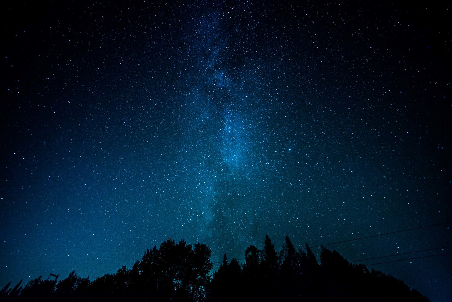 milky way tree silhouette power line star space mystery