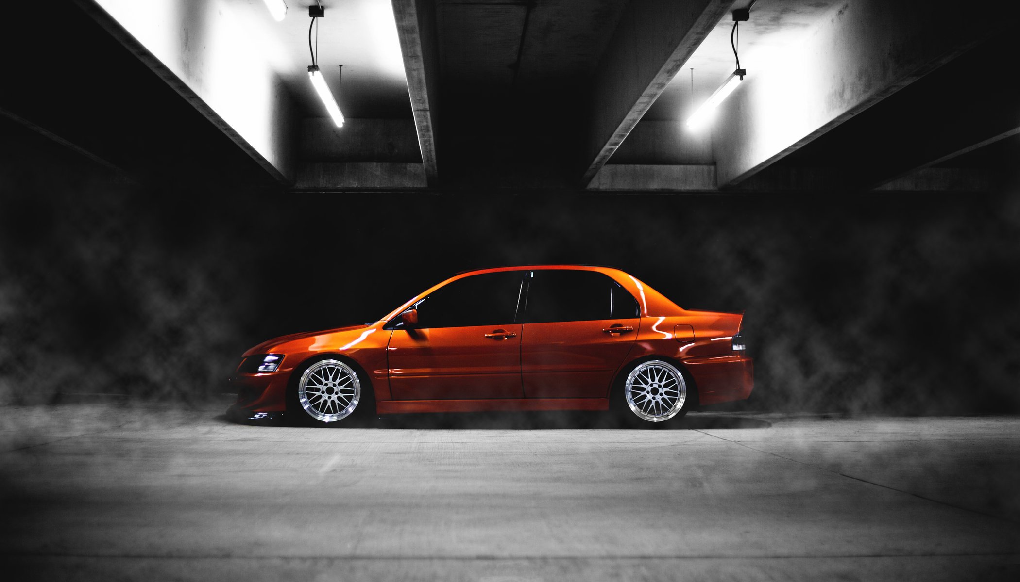 mitshubishi tuning orange niedrig seitlich lancer ix evo evolution